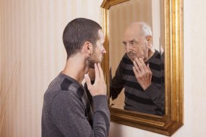 man-mirror-age
